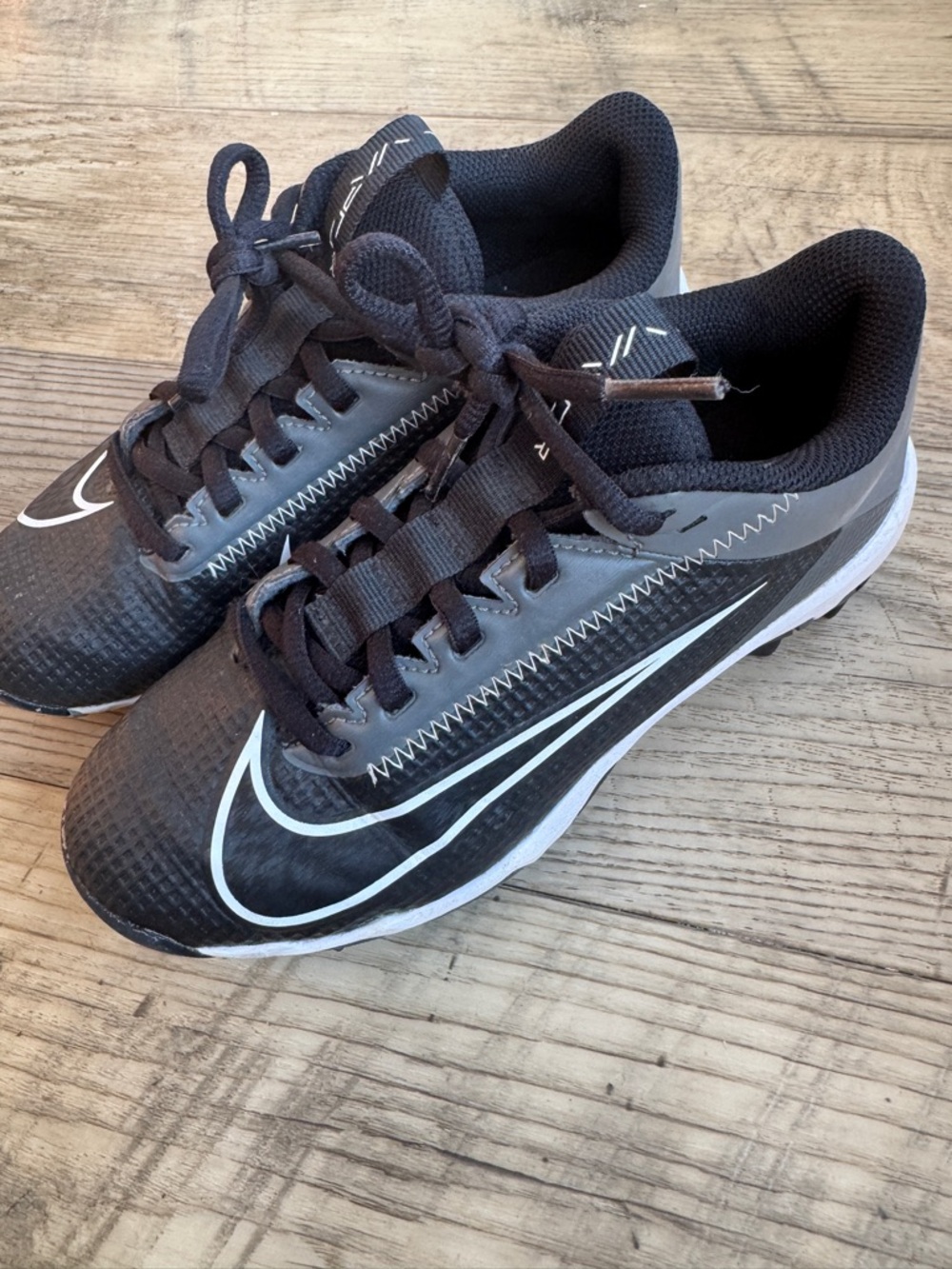 Nike Boys Black and White Cleats size 2Y